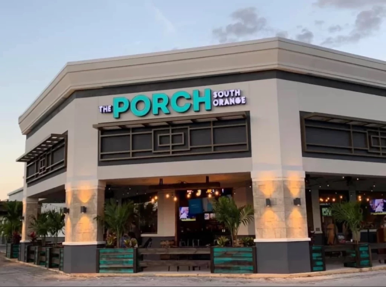 The Porch South Orange modern building exterior at dusk
